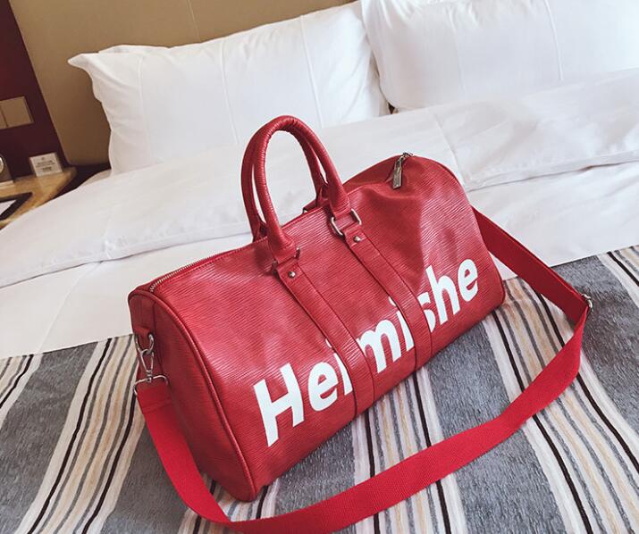 High quality designer duffle bag Men women fashion travel luggage duffel bag Large capacity Zipper leather creative classic expediency overnight bag
